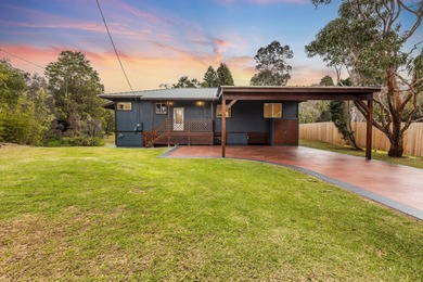 Lovingly built, this newer 3-bedroom, 2-bath custom home is on Volcano Golf and Country Club in Hawaii - for sale on GolfHomes.com, golf home, golf lot