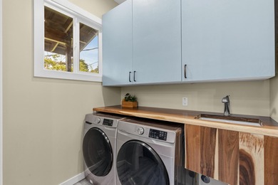 Lovingly built, this newer 3-bedroom, 2-bath custom home is on Volcano Golf and Country Club in Hawaii - for sale on GolfHomes.com, golf home, golf lot