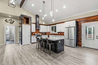 Lovingly built, this newer 3-bedroom, 2-bath custom home is on Volcano Golf and Country Club in Hawaii - for sale on GolfHomes.com, golf home, golf lot