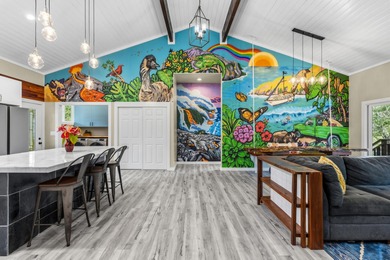 Lovingly built, this newer 3-bedroom, 2-bath custom home is on Volcano Golf and Country Club in Hawaii - for sale on GolfHomes.com, golf home, golf lot