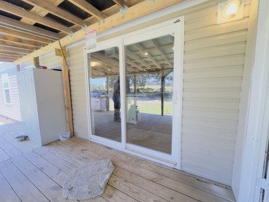 This beautifully designed 2024 Southern Energy-Efficient Smart on Coopers Hawk in Arkansas - for sale on GolfHomes.com, golf home, golf lot