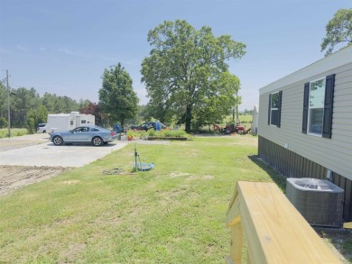 This beautifully designed 2024 Southern Energy-Efficient Smart on Coopers Hawk in Arkansas - for sale on GolfHomes.com, golf home, golf lot