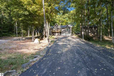 Enjoy 4 seasons at Schuss Mountain!  This updated raised ranch on Schuss Mountain Golf Club in Michigan - for sale on GolfHomes.com, golf home, golf lot