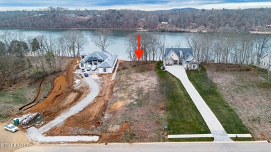 Lot 17 overlooks Watts Bar Lake in the prestigious Tennessee on Tennessee National Golf Club in Tennessee - for sale on GolfHomes.com, golf home, golf lot