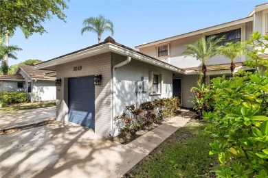 Spacious 3-bed, 2.5-bath townhome with 1-car garage located in on Deer Creek Golf Club in Florida - for sale on GolfHomes.com, golf home, golf lot