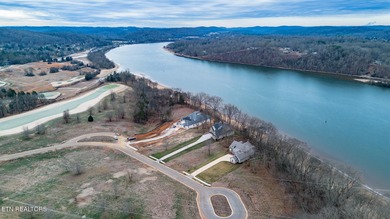 Lot 17 overlooks Watts Bar Lake in the prestigious Tennessee on Tennessee National Golf Club in Tennessee - for sale on GolfHomes.com, golf home, golf lot