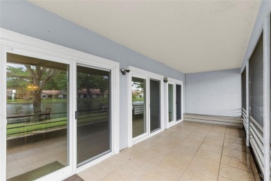 Spacious 3-bed, 2.5-bath townhome with 1-car garage located in on Deer Creek Golf Club in Florida - for sale on GolfHomes.com, golf home, golf lot