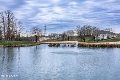 Lot 17 overlooks Watts Bar Lake in the prestigious Tennessee on Tennessee National Golf Club in Tennessee - for sale on GolfHomes.com, golf home, golf lot