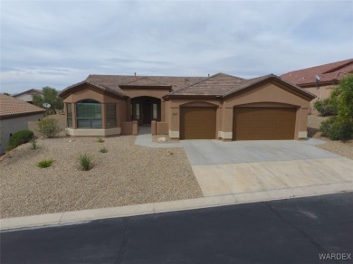 Home is located on a large lot. New interior paint, ceiling fans on Laughlin Ranch Golf Club in Arizona - for sale on GolfHomes.com, golf home, golf lot