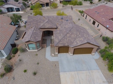 Home is located on a large lot. New interior paint, ceiling fans on Laughlin Ranch Golf Club in Arizona - for sale on GolfHomes.com, golf home, golf lot