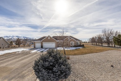 Charming single-family home on just over 1 acre. This 3-bed, 2.5 on Spring Creek Golf Course in Nevada - for sale on GolfHomes.com, golf home, golf lot