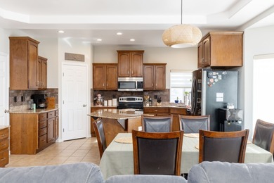 Charming single-family home on just over 1 acre. This 3-bed, 2.5 on Spring Creek Golf Course in Nevada - for sale on GolfHomes.com, golf home, golf lot