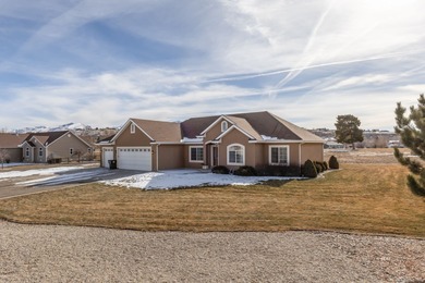 Charming single-family home on just over 1 acre. This 3-bed, 2.5 on Spring Creek Golf Course in Nevada - for sale on GolfHomes.com, golf home, golf lot