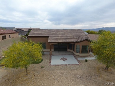 Home is located on a large lot. New interior paint, ceiling fans on Laughlin Ranch Golf Club in Arizona - for sale on GolfHomes.com, golf home, golf lot