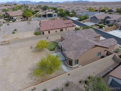 Home is located on a large lot. New interior paint, ceiling fans on Laughlin Ranch Golf Club in Arizona - for sale on GolfHomes.com, golf home, golf lot