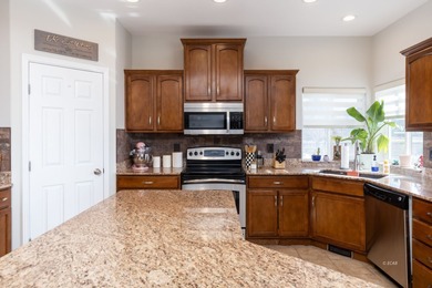 Charming single-family home on just over 1 acre. This 3-bed, 2.5 on Spring Creek Golf Course in Nevada - for sale on GolfHomes.com, golf home, golf lot