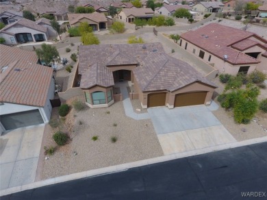 Home is located on a large lot. New interior paint, ceiling fans on Laughlin Ranch Golf Club in Arizona - for sale on GolfHomes.com, golf home, golf lot