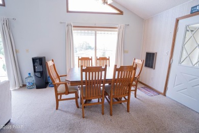 Welcome to this spacious ranch home in The Hideout, a gated on The Hideout Golf in Pennsylvania - for sale on GolfHomes.com, golf home, golf lot