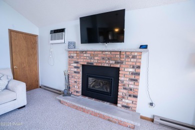 Welcome to this spacious ranch home in The Hideout, a gated on The Hideout Golf in Pennsylvania - for sale on GolfHomes.com, golf home, golf lot