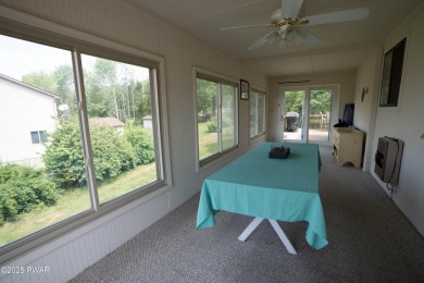 Welcome to this spacious ranch home in The Hideout, a gated on The Hideout Golf in Pennsylvania - for sale on GolfHomes.com, golf home, golf lot