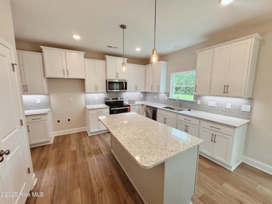 Experience the brand new Belton plan, now available in Bell on Green Hills Golf Course in North Carolina - for sale on GolfHomes.com, golf home, golf lot