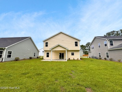 Experience the brand new Belton plan, now available in Bell on Green Hills Golf Course in North Carolina - for sale on GolfHomes.com, golf home, golf lot