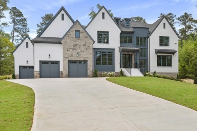 This exceptional new custom construction all brick home with 6 on Indian Hills Country Club in Georgia - for sale on GolfHomes.com, golf home, golf lot