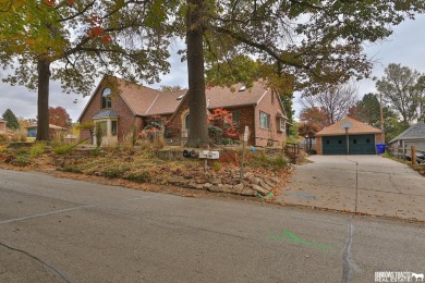 Experience the perfect blend of modern elegance and classic on Syracuse Golf Course in Nebraska - for sale on GolfHomes.com, golf home, golf lot