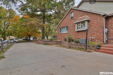 Experience the perfect blend of modern elegance and classic on Syracuse Golf Course in Nebraska - for sale on GolfHomes.com, golf home, golf lot