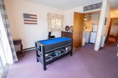 Welcome to this spacious ranch home in The Hideout, a gated on The Hideout Golf in Pennsylvania - for sale on GolfHomes.com, golf home, golf lot