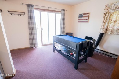 Welcome to this spacious ranch home in The Hideout, a gated on The Hideout Golf in Pennsylvania - for sale on GolfHomes.com, golf home, golf lot