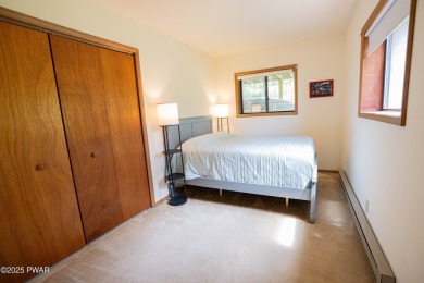 Welcome to this spacious ranch home in The Hideout, a gated on The Hideout Golf in Pennsylvania - for sale on GolfHomes.com, golf home, golf lot