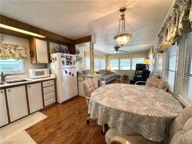 Welcome to this beautifully maintained 2 bedroom, 2 bath mobile on Breckenridge Golf and Country Club in Florida - for sale on GolfHomes.com, golf home, golf lot