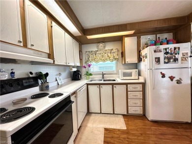 Welcome to this beautifully maintained 2 bedroom, 2 bath mobile on Breckenridge Golf and Country Club in Florida - for sale on GolfHomes.com, golf home, golf lot