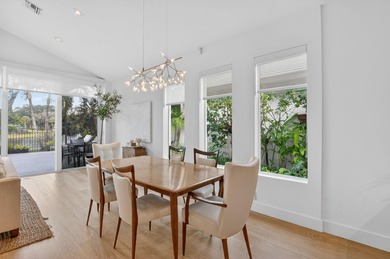 Discover refined single-story living in the prestigious Whisper on Broken Sound Golf and Club  in Florida - for sale on GolfHomes.com, golf home, golf lot