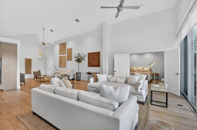 Discover refined single-story living in the prestigious Whisper on Broken Sound Golf and Club  in Florida - for sale on GolfHomes.com, golf home, golf lot