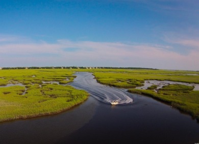 This is a spectacular Marsh view property on one oi the most on DeBordieu Country Club in South Carolina - for sale on GolfHomes.com, golf home, golf lot