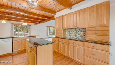 Nestled in the desirable Tanglwood Lakes community, this on Paupack Hills Golf and Country Club in Pennsylvania - for sale on GolfHomes.com, golf home, golf lot