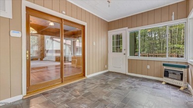 Nestled in the desirable Tanglwood Lakes community, this on Paupack Hills Golf and Country Club in Pennsylvania - for sale on GolfHomes.com, golf home, golf lot