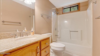 Nestled in the desirable Tanglwood Lakes community, this on Paupack Hills Golf and Country Club in Pennsylvania - for sale on GolfHomes.com, golf home, golf lot