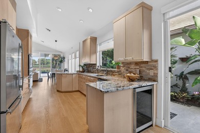 Discover refined single-story living in the prestigious Whisper on Broken Sound Golf and Club  in Florida - for sale on GolfHomes.com, golf home, golf lot