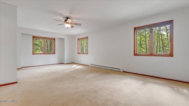 Nestled in the desirable Tanglwood Lakes community, this on Paupack Hills Golf and Country Club in Pennsylvania - for sale on GolfHomes.com, golf home, golf lot