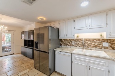 Welcome to this beautifully maintained all-brick townhome that on Dunwoody Country Club in Georgia - for sale on GolfHomes.com, golf home, golf lot