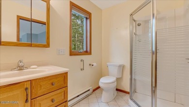 Nestled in the desirable Tanglwood Lakes community, this on Paupack Hills Golf and Country Club in Pennsylvania - for sale on GolfHomes.com, golf home, golf lot