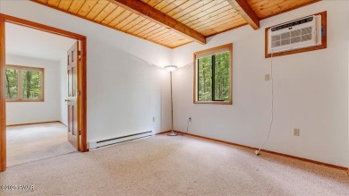 Nestled in the desirable Tanglwood Lakes community, this on Paupack Hills Golf and Country Club in Pennsylvania - for sale on GolfHomes.com, golf home, golf lot