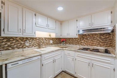 Welcome to this beautifully maintained all-brick townhome that on Dunwoody Country Club in Georgia - for sale on GolfHomes.com, golf home, golf lot