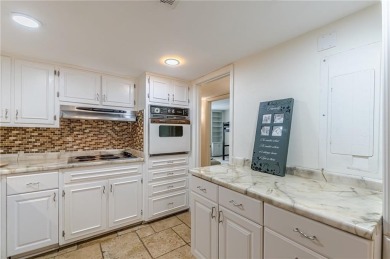 Welcome to this beautifully maintained all-brick townhome that on Dunwoody Country Club in Georgia - for sale on GolfHomes.com, golf home, golf lot