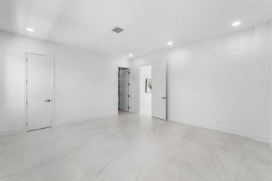 Step into a stunning, fully renovated penthouse condo that on Polo Club of Boca Raton in Florida - for sale on GolfHomes.com, golf home, golf lot