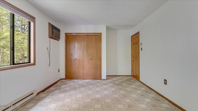 Nestled in the desirable Tanglwood Lakes community, this on Paupack Hills Golf and Country Club in Pennsylvania - for sale on GolfHomes.com, golf home, golf lot