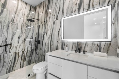 Step into a stunning, fully renovated penthouse condo that on Polo Club of Boca Raton in Florida - for sale on GolfHomes.com, golf home, golf lot